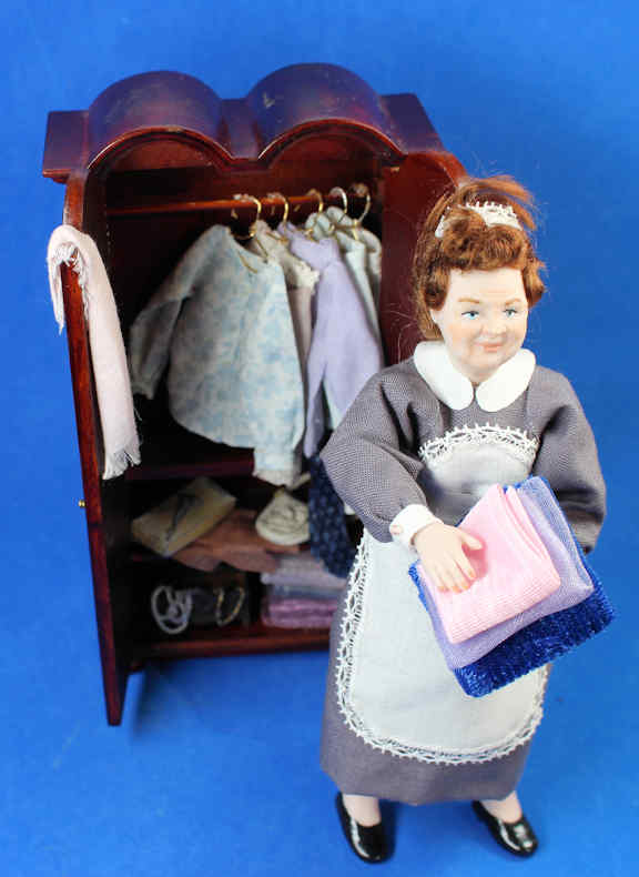 (image for) Maid putting away laundry