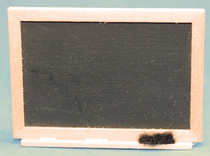 (image for) Blackboard with chalk and black eraser