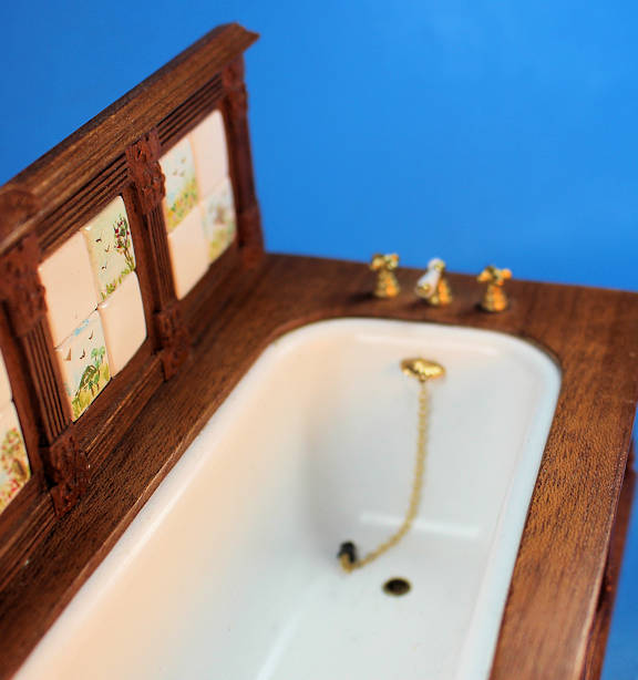 Bathroom tub with hand painted ceramic tiles
