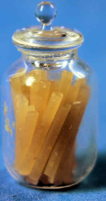 Jar of candy sticks (image for) Jar of candy sticks