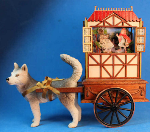Dog pulling puppet theater - Click Image to Close