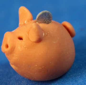 (image for) Piggy bank with coin